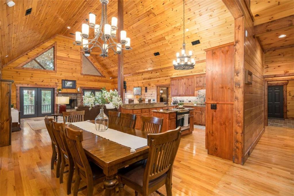 31 High Cliff Road Jasper, GA 30143 - Photo 3 of 50 a view of a dining room with furniture and wooden floor