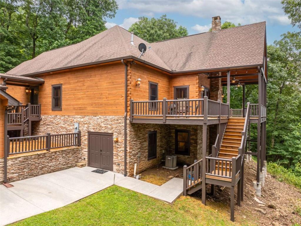 31 High Cliff Road Jasper, GA 30143 - Photo 43 of 50 aerial view of a house with a yard and furniture