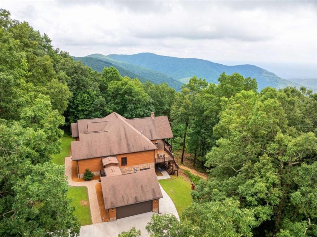 31 High Cliff Road Jasper, GA 30143 - Photo 45 of 50 an aerial view of a house with a yard and lake view