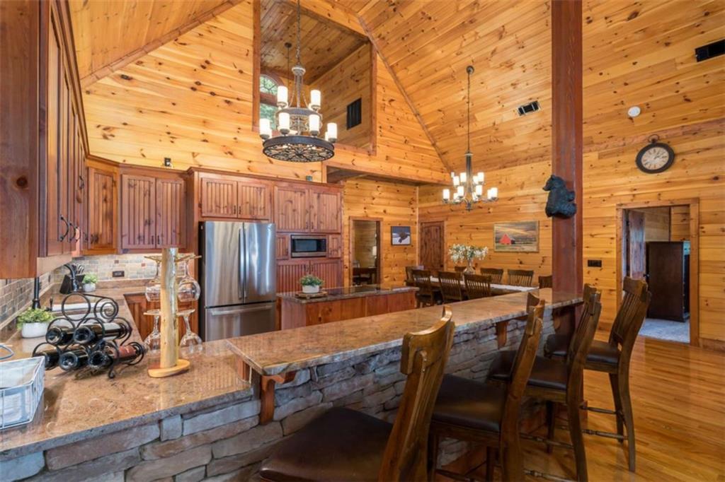 31 High Cliff Road Jasper, GA 30143 - Photo 8 of 50 a view of a patio with table and chairs