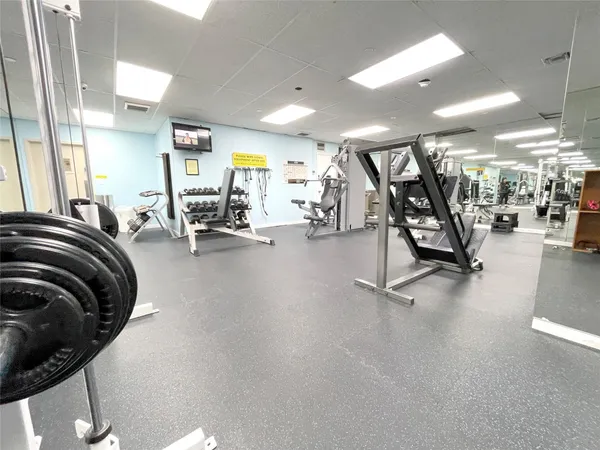 a view of a room with gym equipment