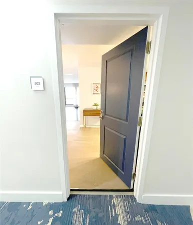 a view of a livingroom with a furniture and window