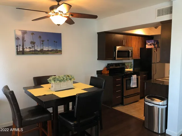 a view of a dining room with furniture