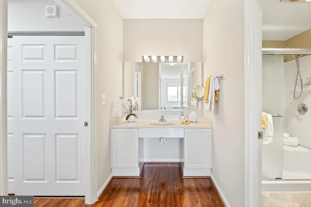 a view of a kitchen from the hallway