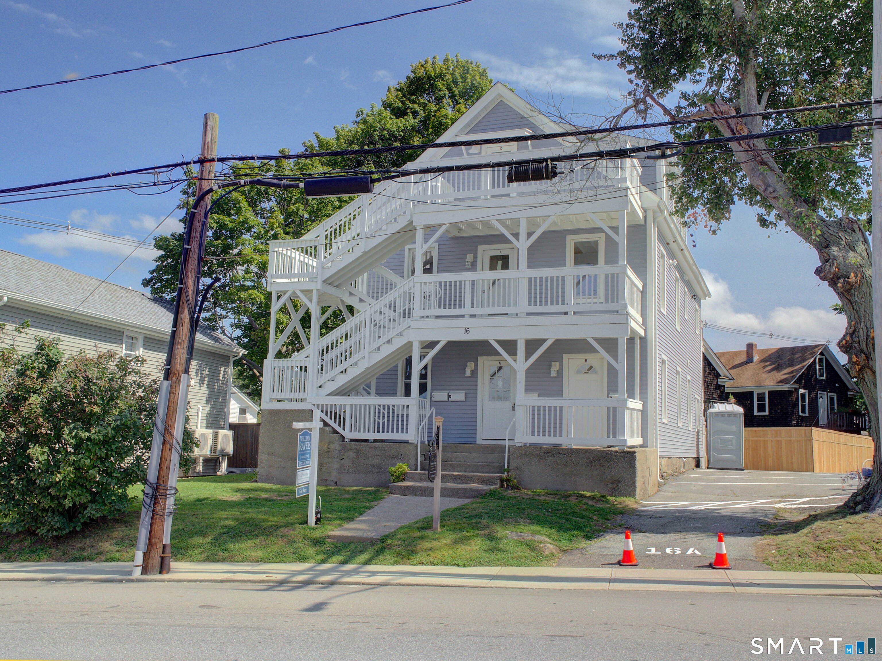 a front view of a house with garage