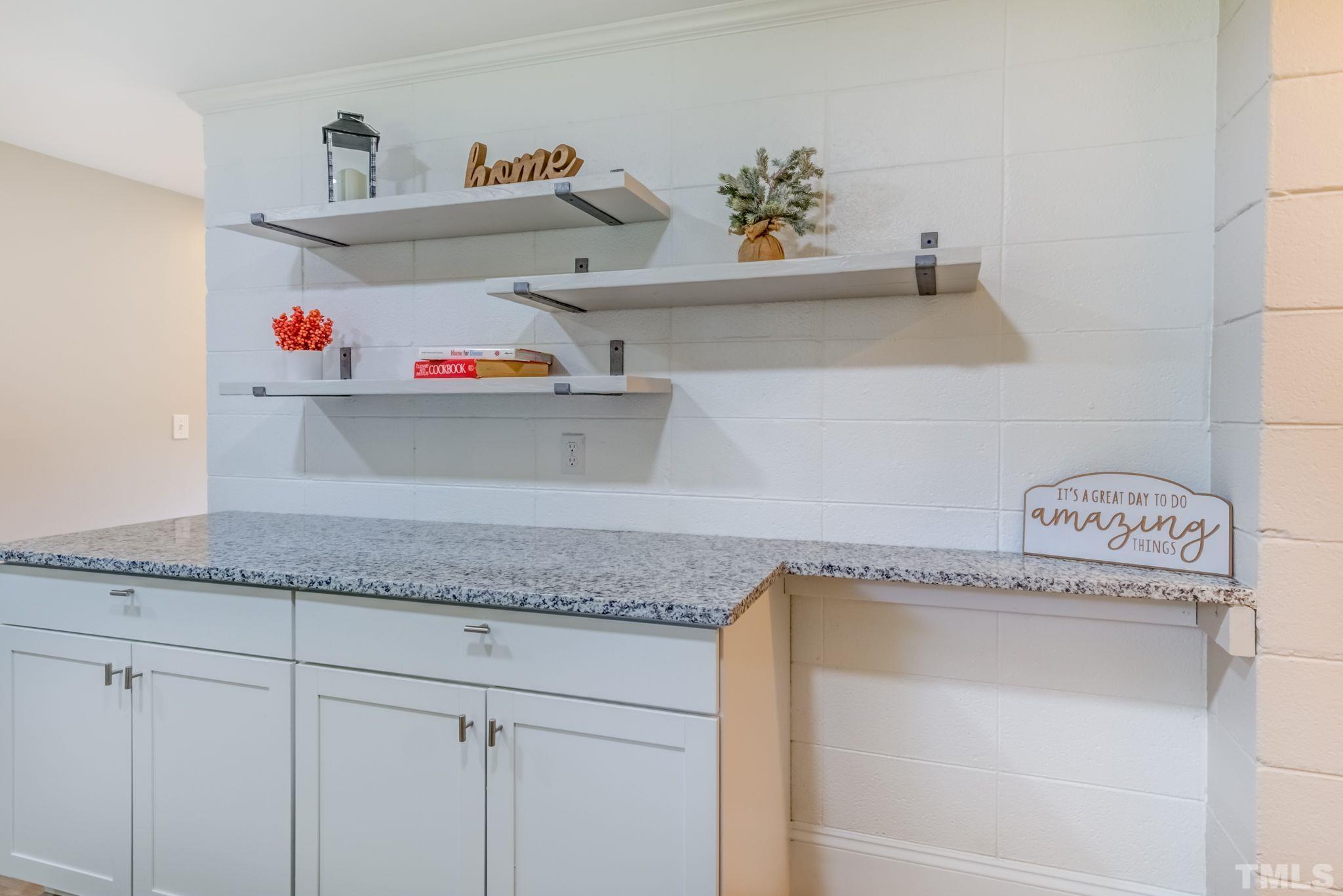 9800 Fanny Brown Road Raleigh, NC 27603 - Photo 8 of 29 a utility room with cabinets and window