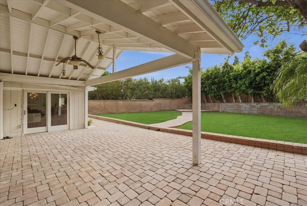 11413 Etiwanda Avenue Porter Ranch, CA 91326 - Photo 14 of 49 a view of a house with a yard