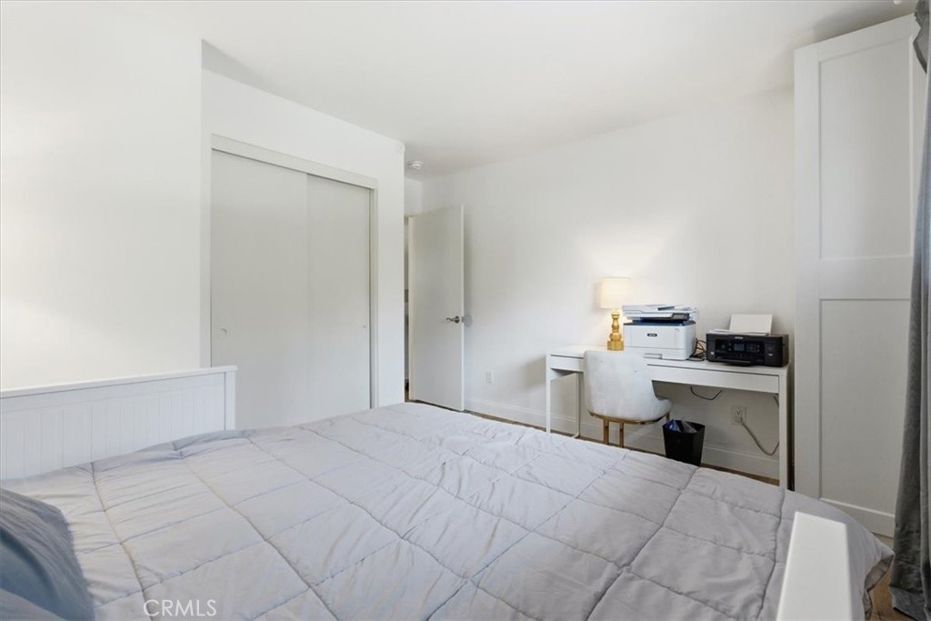 11413 Etiwanda Avenue Porter Ranch, CA 91326 - Photo 17 of 49 a view of a kitchen with sink cabinets and a window