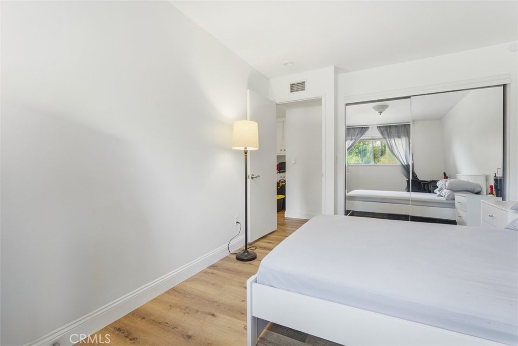 11413 Etiwanda Avenue Porter Ranch, CA 91326 - Photo 19 of 49 a bedroom with a bed and a couch