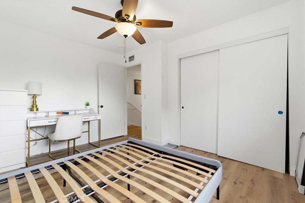 11413 Etiwanda Avenue Porter Ranch, CA 91326 - Photo 24 of 49 a view of a livingroom with furniture and chandelier fan
