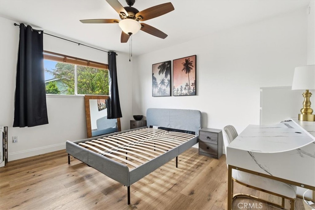 11413 Etiwanda Avenue Porter Ranch, CA 91326 - Photo 25 of 49 a bedroom with a bed and a window