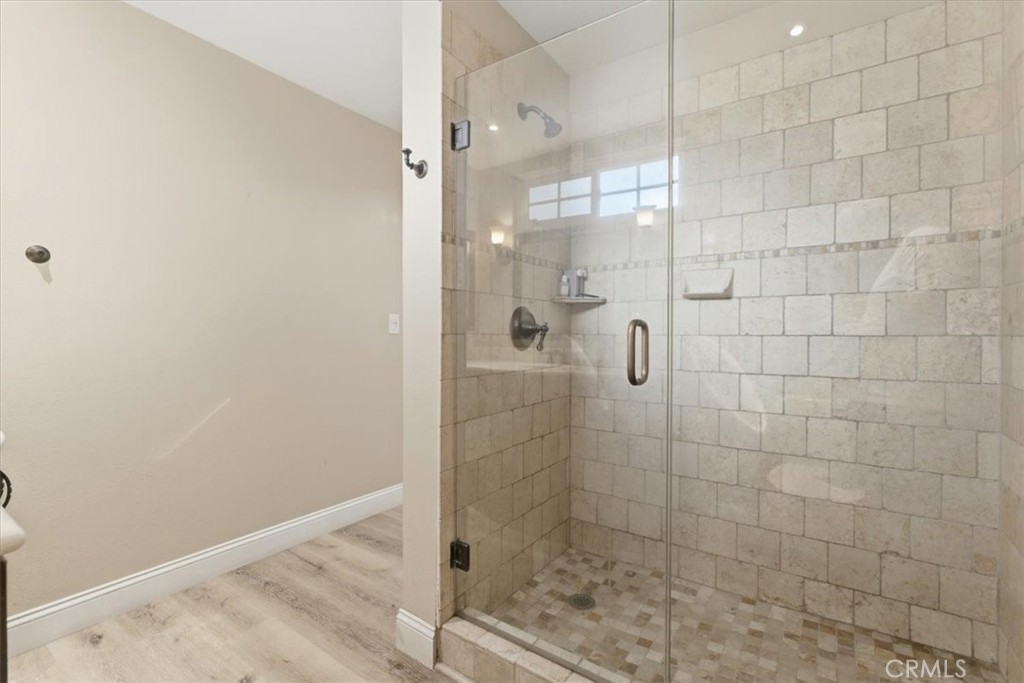 11413 Etiwanda Avenue Porter Ranch, CA 91326 - Photo 28 of 49 a bathroom with a shower