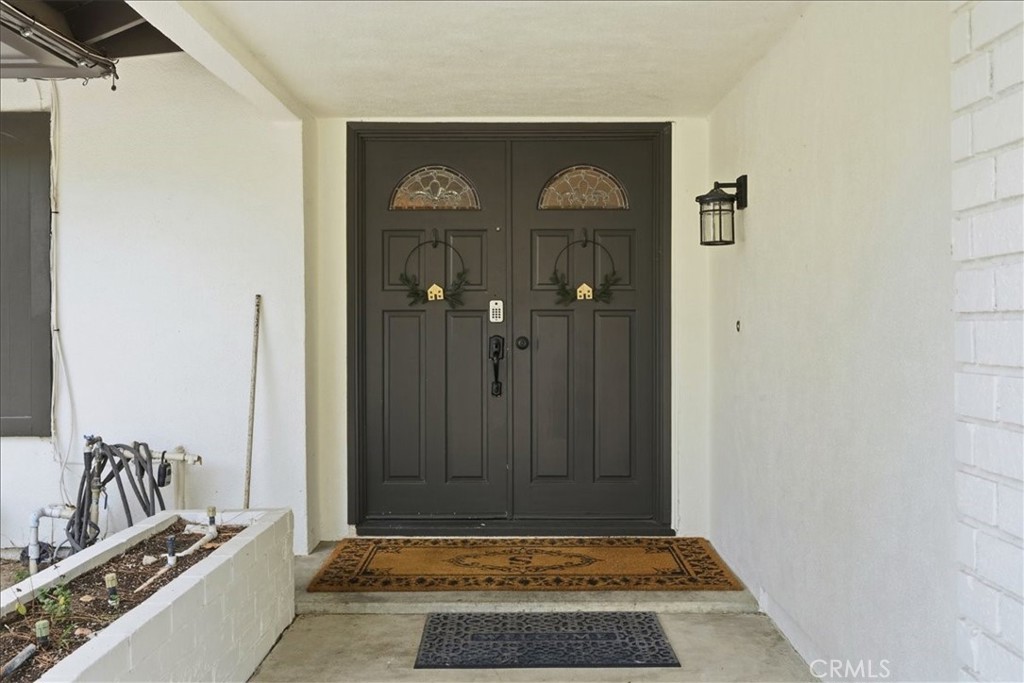 11413 Etiwanda Avenue Porter Ranch, CA 91326 - Photo 49 of 49 a view of a hallway with a bathroom