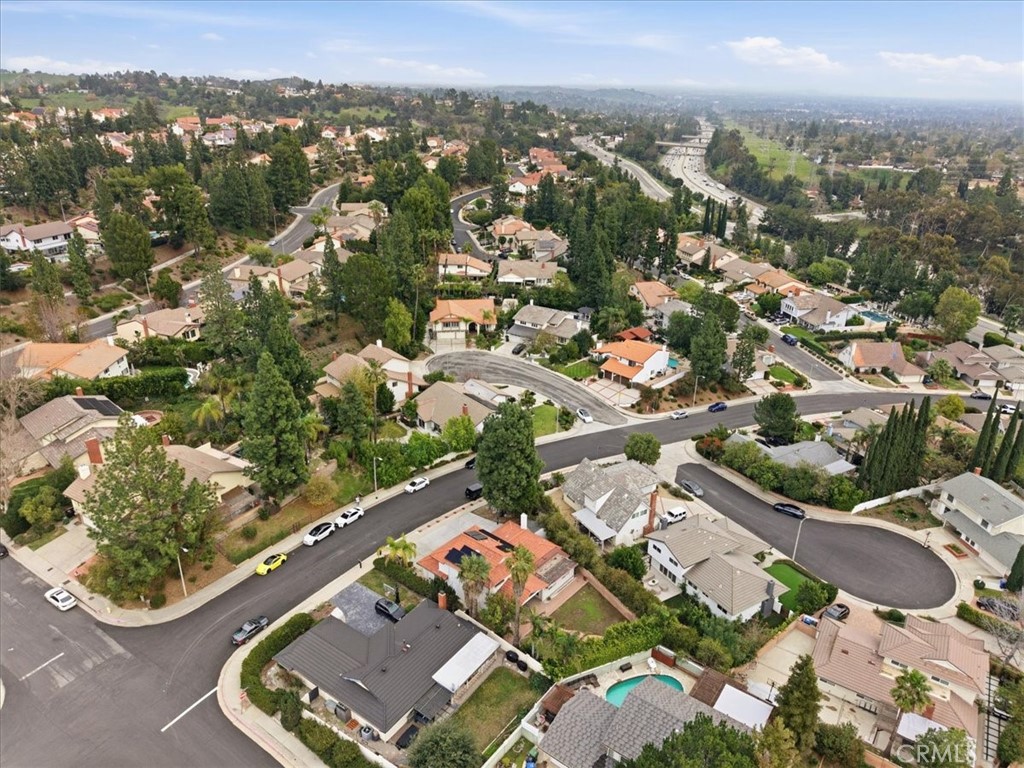 11413 Etiwanda Avenue Porter Ranch, CA 91326 - Photo 10 of 49 an aerial view of residential houses with outdoor space