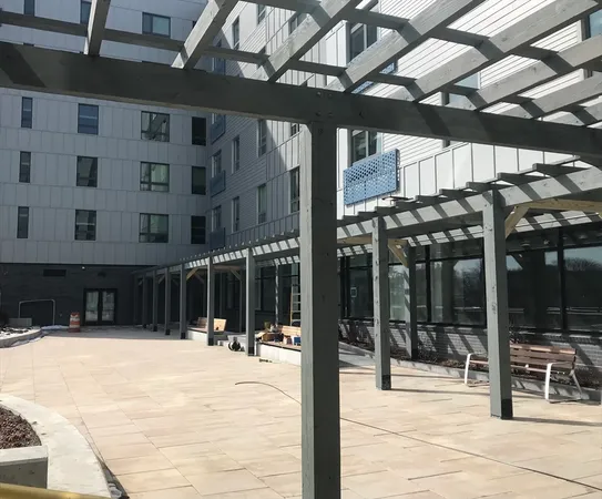 a view of roof deck with patio