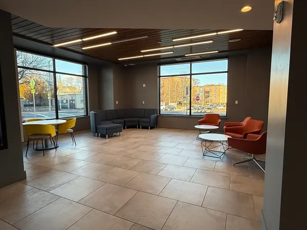 a view of a workspace with furniture