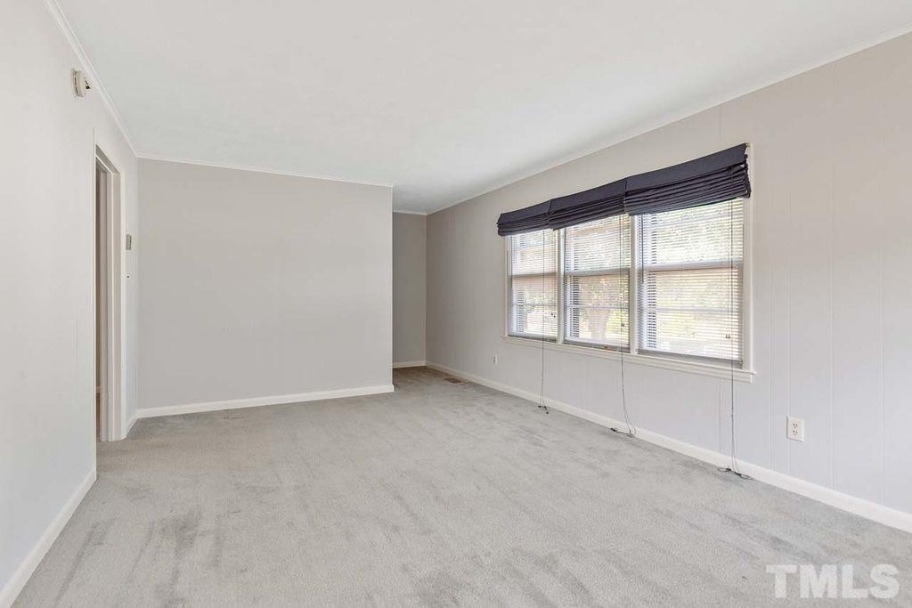 3806 Lee Road Raleigh, NC 27604 - Photo 16 of 33 an empty room with windows