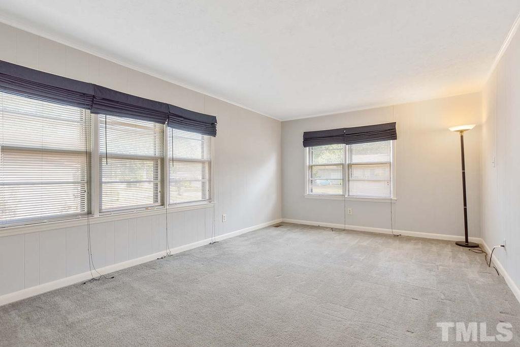 3806 Lee Road Raleigh, NC 27604 - Photo 17 of 33 an empty room with windows