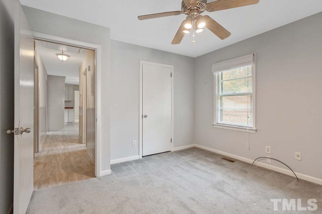 3806 Lee Road Raleigh, NC 27604 - Photo 20 of 33 a view of an empty room with a window