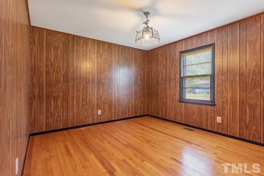 3806 Lee Road Raleigh, NC 27604 - Photo 23 of 33 an empty room with windows