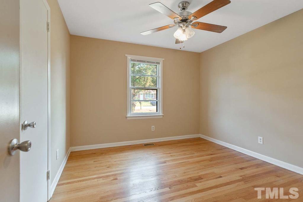 3806 Lee Road Raleigh, NC 27604 - Photo 28 of 33 wooden floor in an empty room with a window
