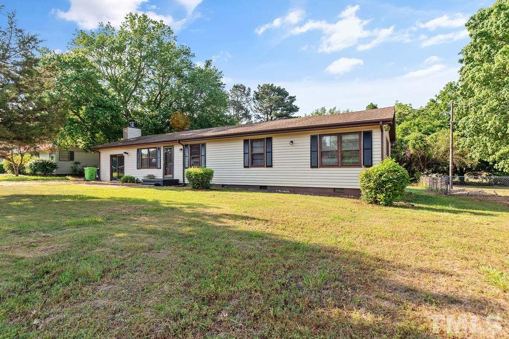 3806 Lee Road Raleigh, NC 27604 - Photo 3 of 33 a front view of house with yard and trees in the background