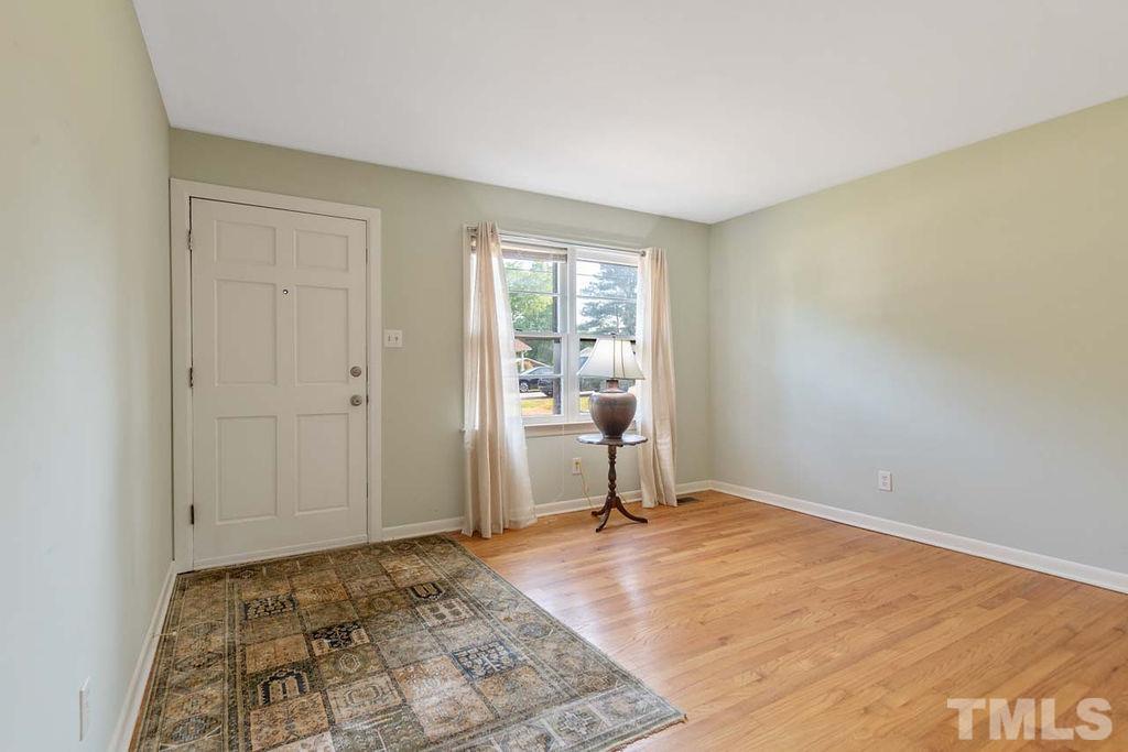 3806 Lee Road Raleigh, NC 27604 - Photo 8 of 33 a view of an empty room and window