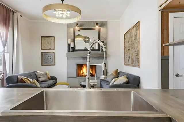 a view of living room with furniture and window