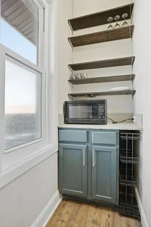 a kitchen with a cabinets and appliances