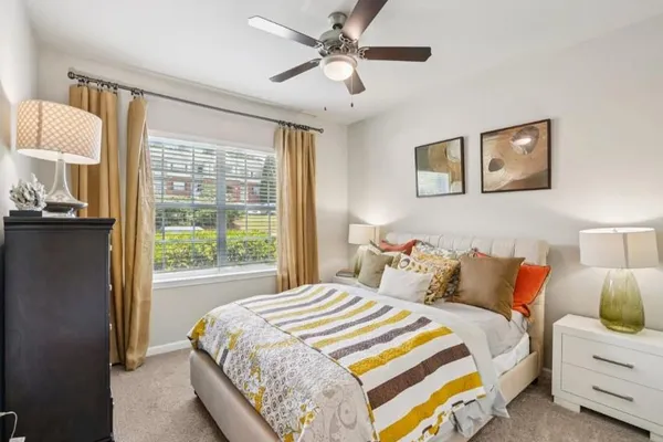 a bed room with a bed and a couch