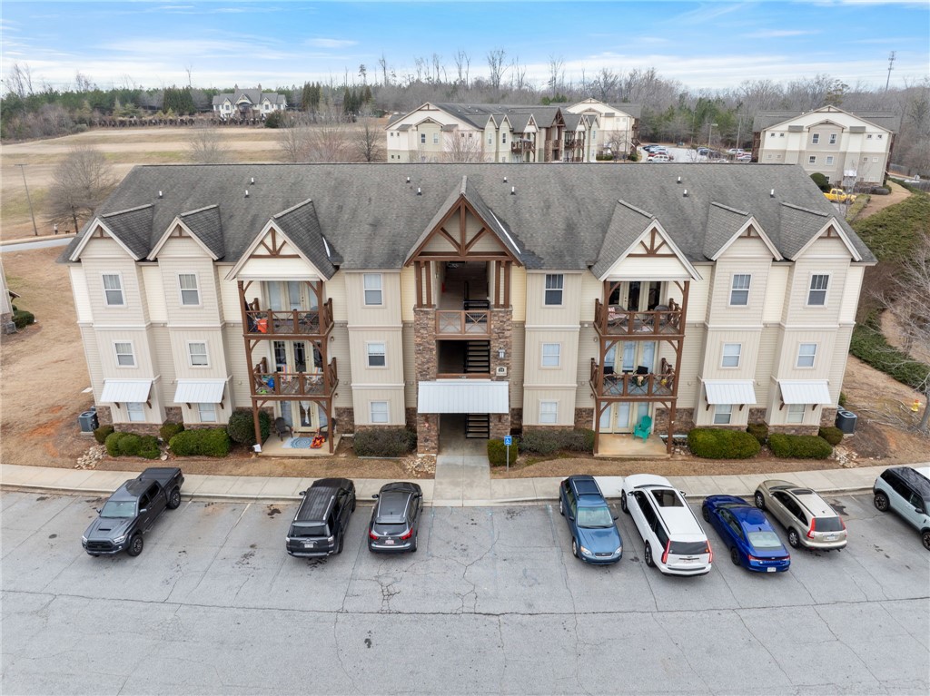 1432 Gadwall Way Seneca, SC 29678 - Photo 6 of 35 This multi-story dwelling features inviting balconies, ideal for relaxation and outdoor enjoyment.