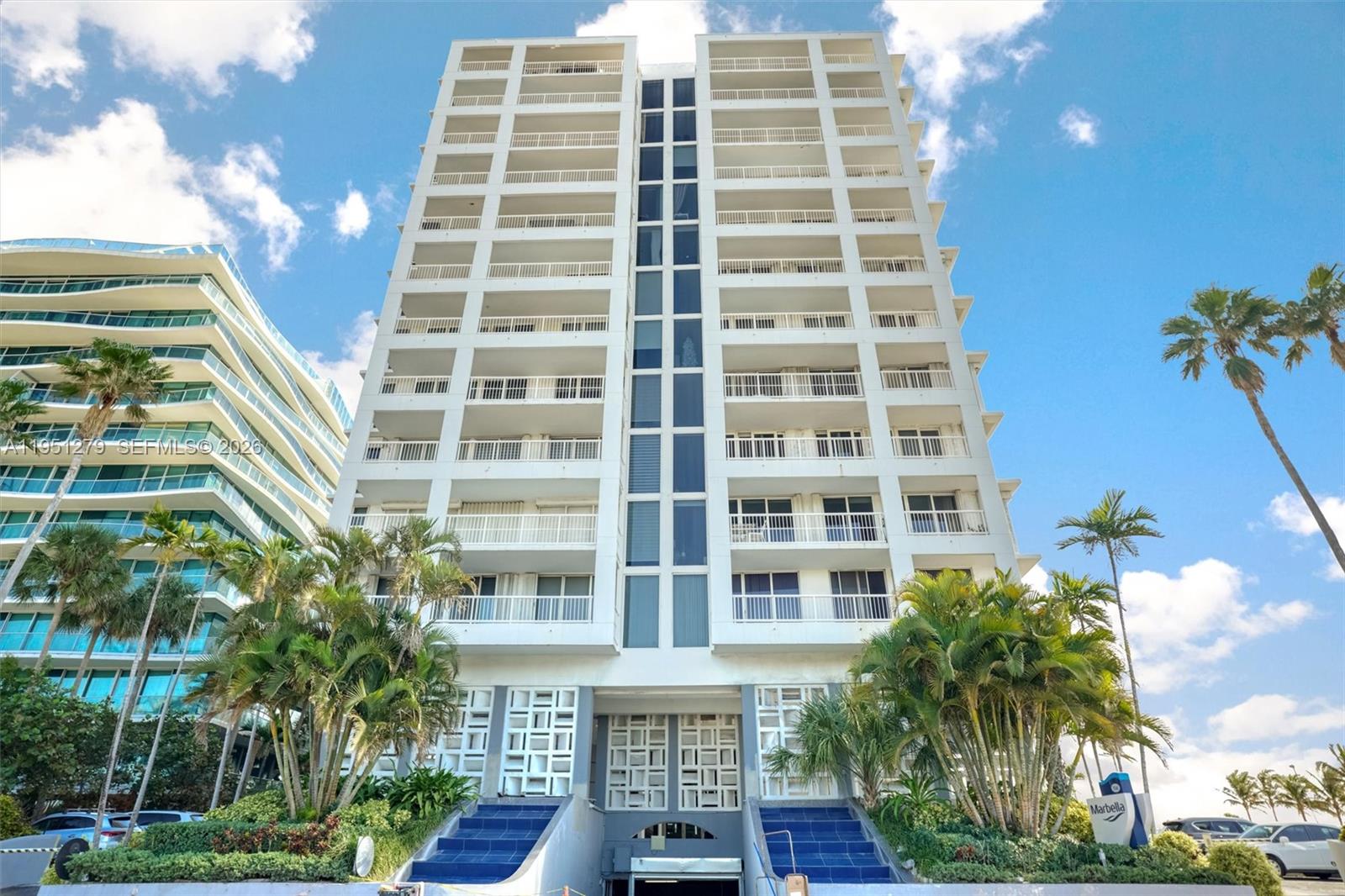 9341 Collins Avenue, Unit 201 Surfside, FL 33154 - Photo 1 of 34 a front view of a multi story building