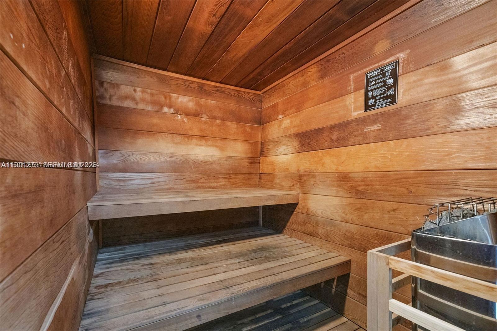 9341 Collins Avenue, Unit 201 Surfside, FL 33154 - Photo 32 of 34 a view of storage and utility room