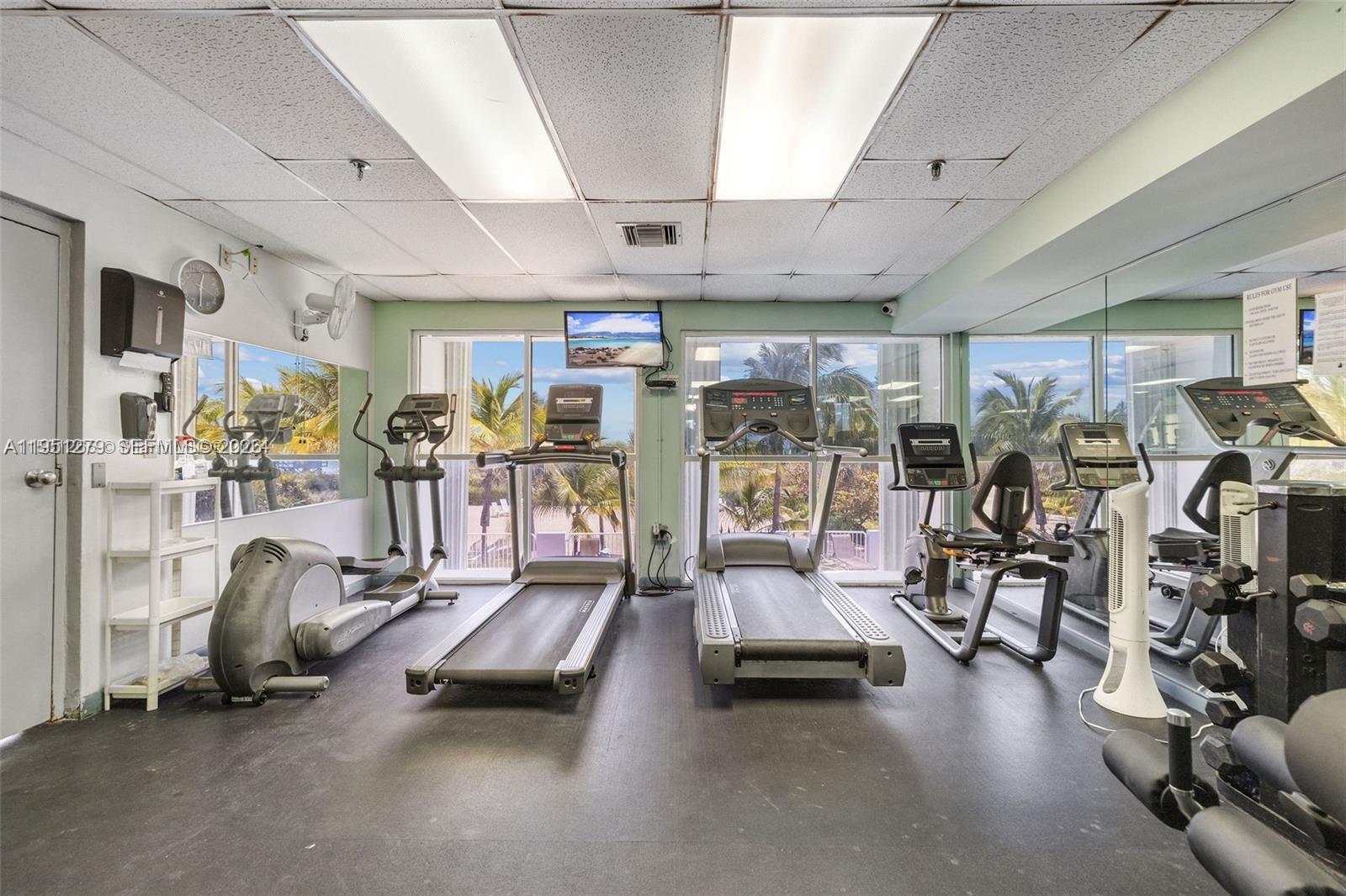 9341 Collins Avenue, Unit 201 Surfside, FL 33154 - Photo 33 of 34 a view of a room with gym equipment