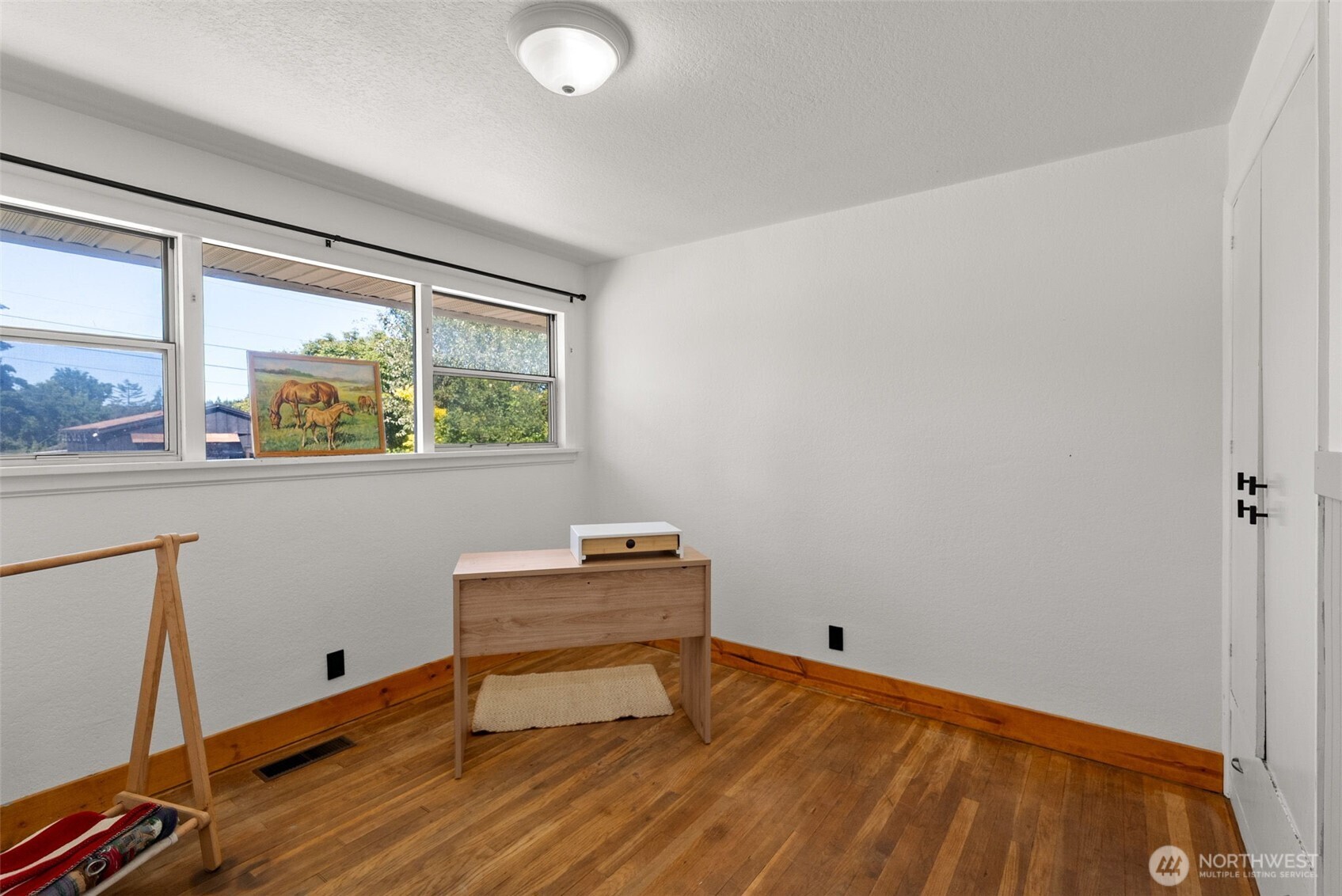 2710 Holman Street Bremerton, WA 98310 - Photo 12 of 25 a room with wooden floor and a window