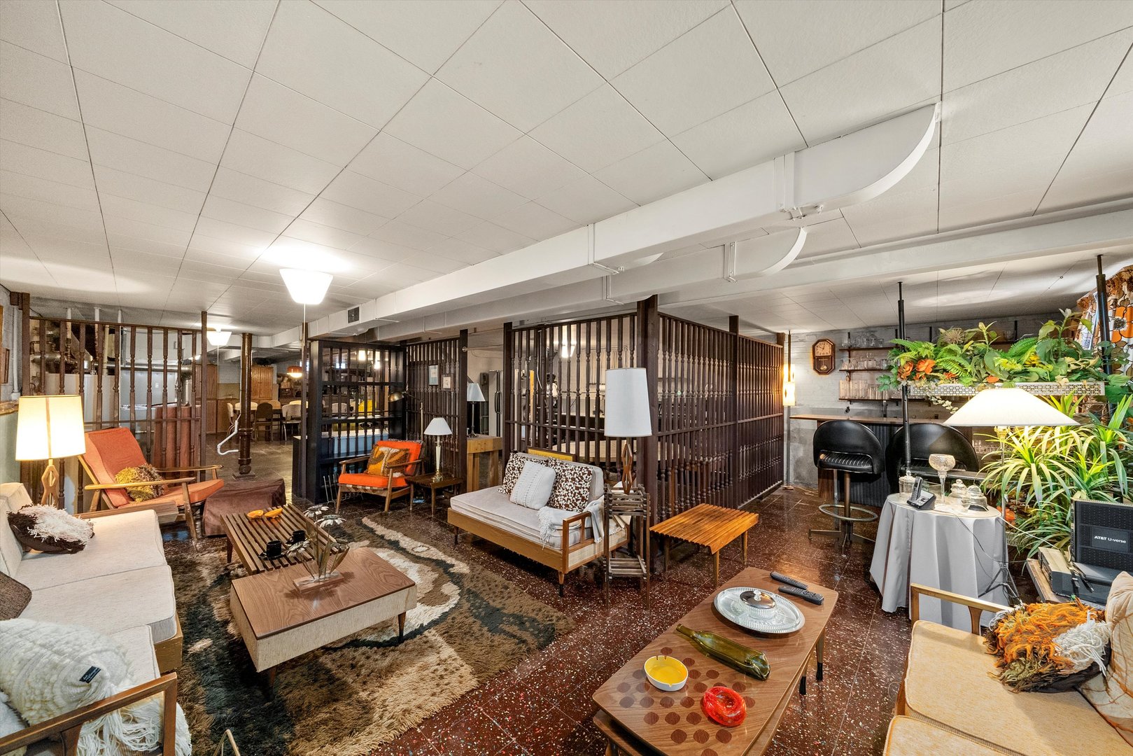 3915 West 64th Place Chicago, IL 60629 - Photo 24 of 34 a living room with lots of furniture and a chandelier