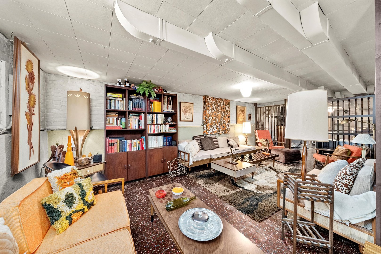 3915 West 64th Place Chicago, IL 60629 - Photo 25 of 34 a living room with furniture a bookshelf and a window