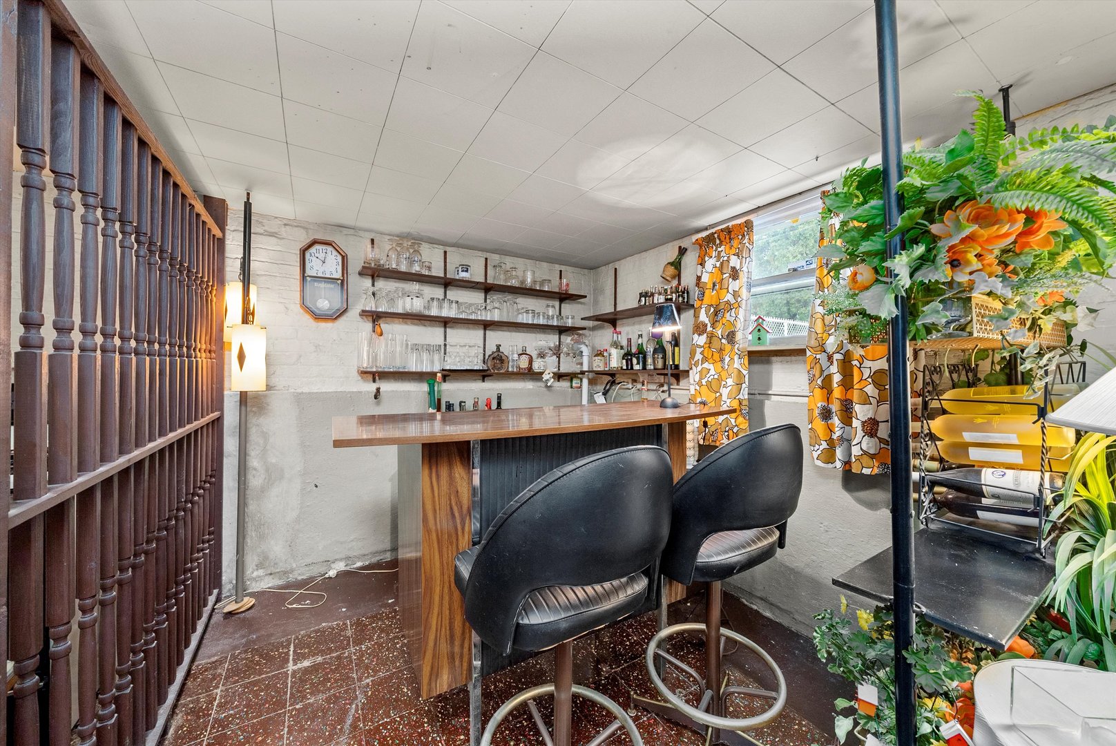 3915 West 64th Place Chicago, IL 60629 - Photo 26 of 34 a dining room with furniture and a potted plant
