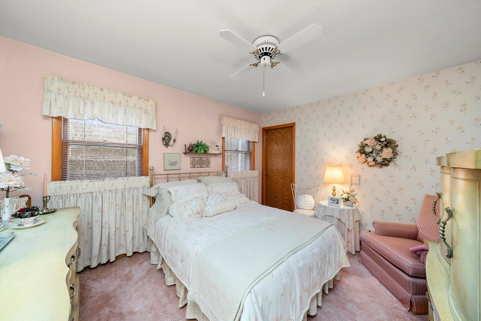 3915 West 64th Place Chicago, IL 60629 - Photo 5 of 34 a bedroom with a bed and a chandelier