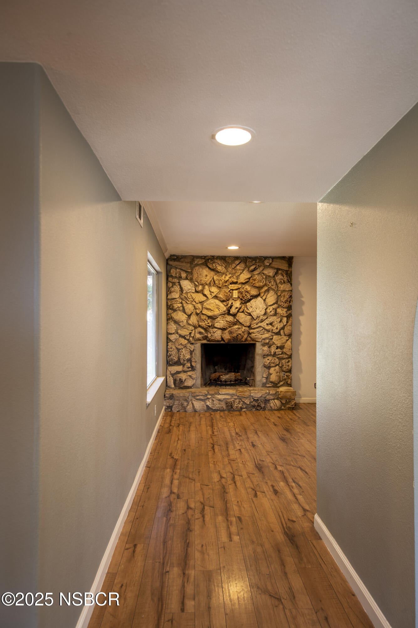 3118 Pellham Drive Lompoc, CA 93436 - Photo 18 of 56 a view of empty room with wooden floor and fireplace