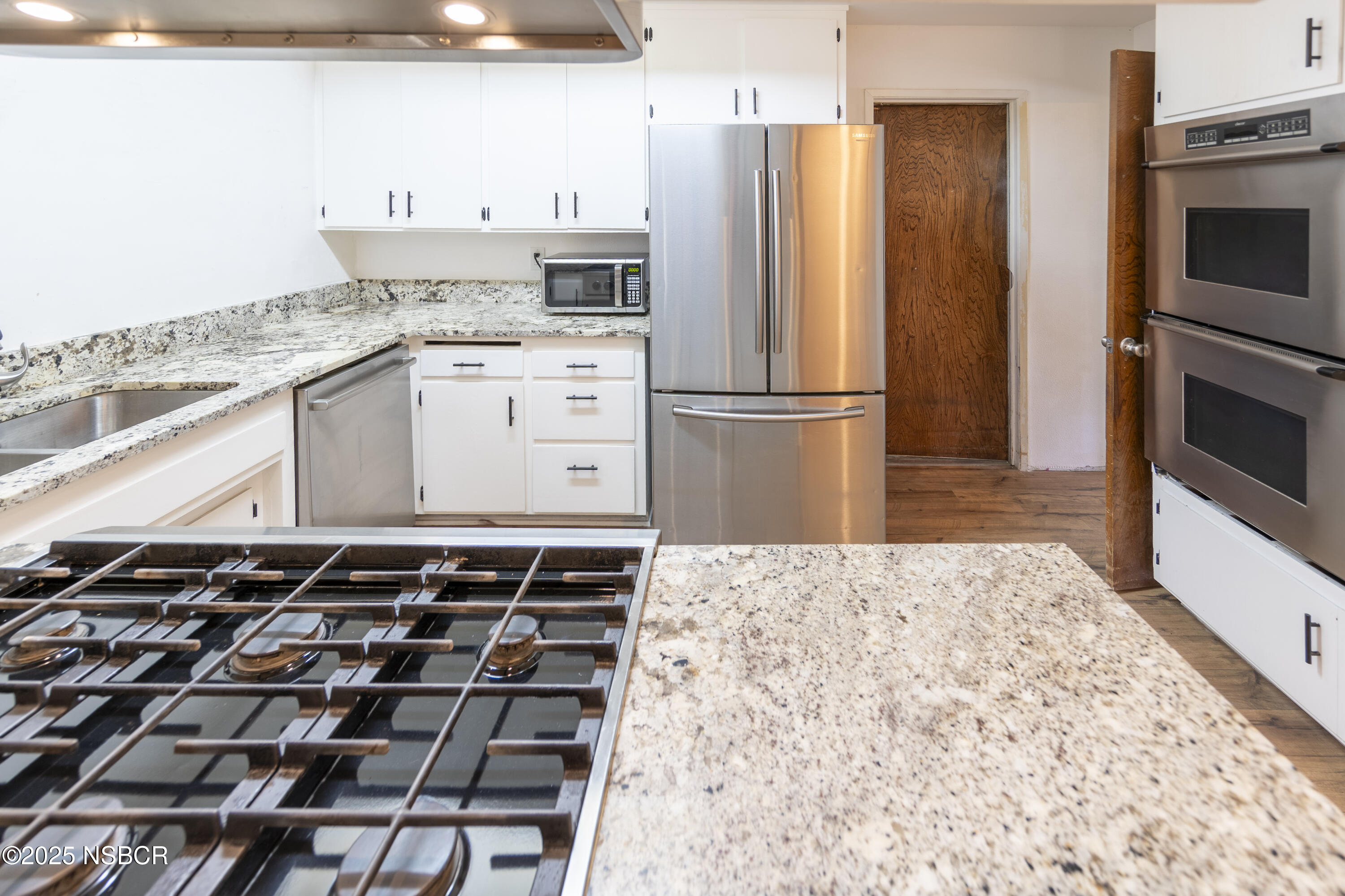 3118 Pellham Drive Lompoc, CA 93436 - Photo 31 of 56 a kitchen with a refrigerator and a stove top oven