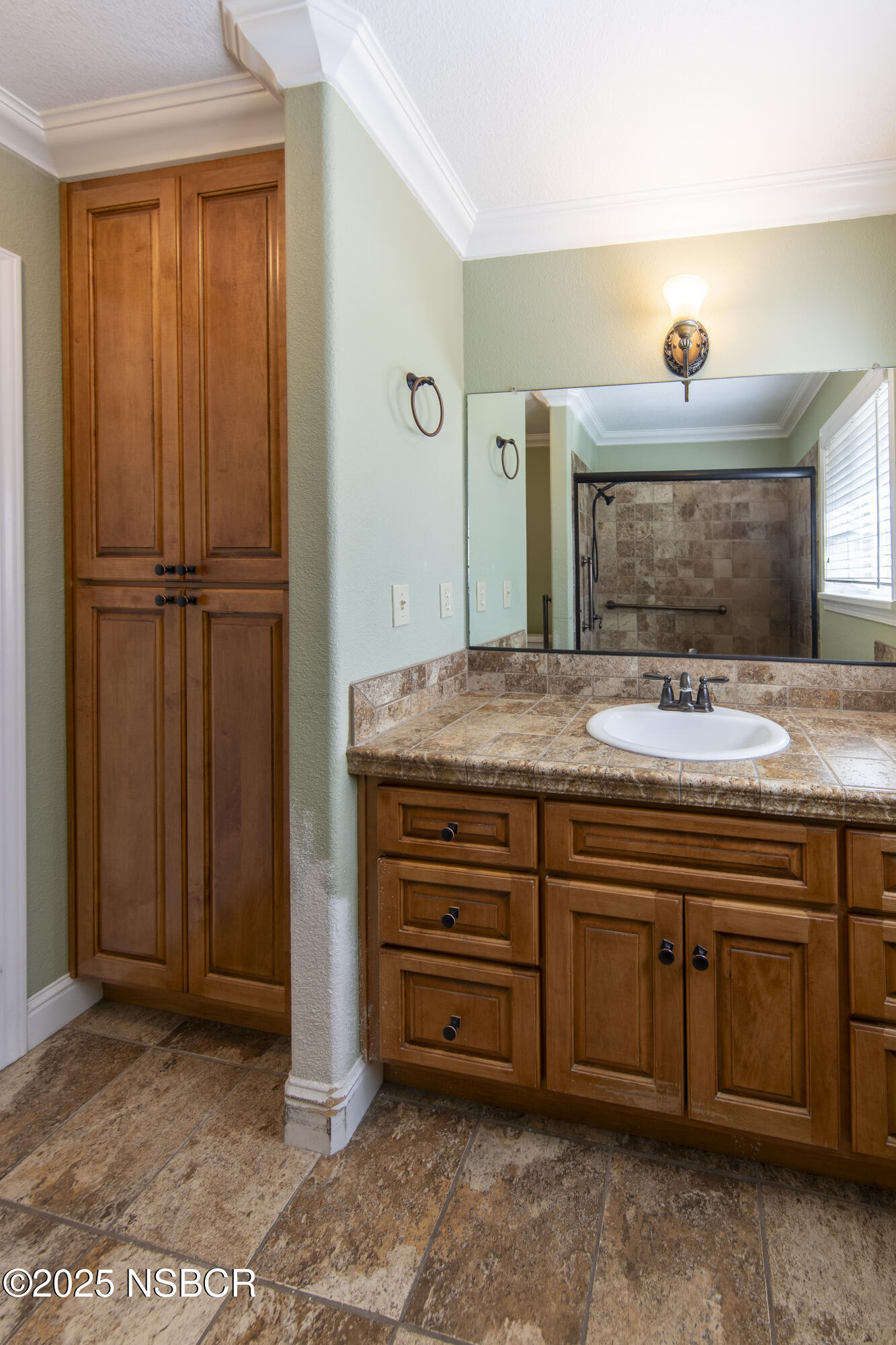 3118 Pellham Drive Lompoc, CA 93436 - Photo 42 of 56 a view of cabinets a sink and a mirror in a room