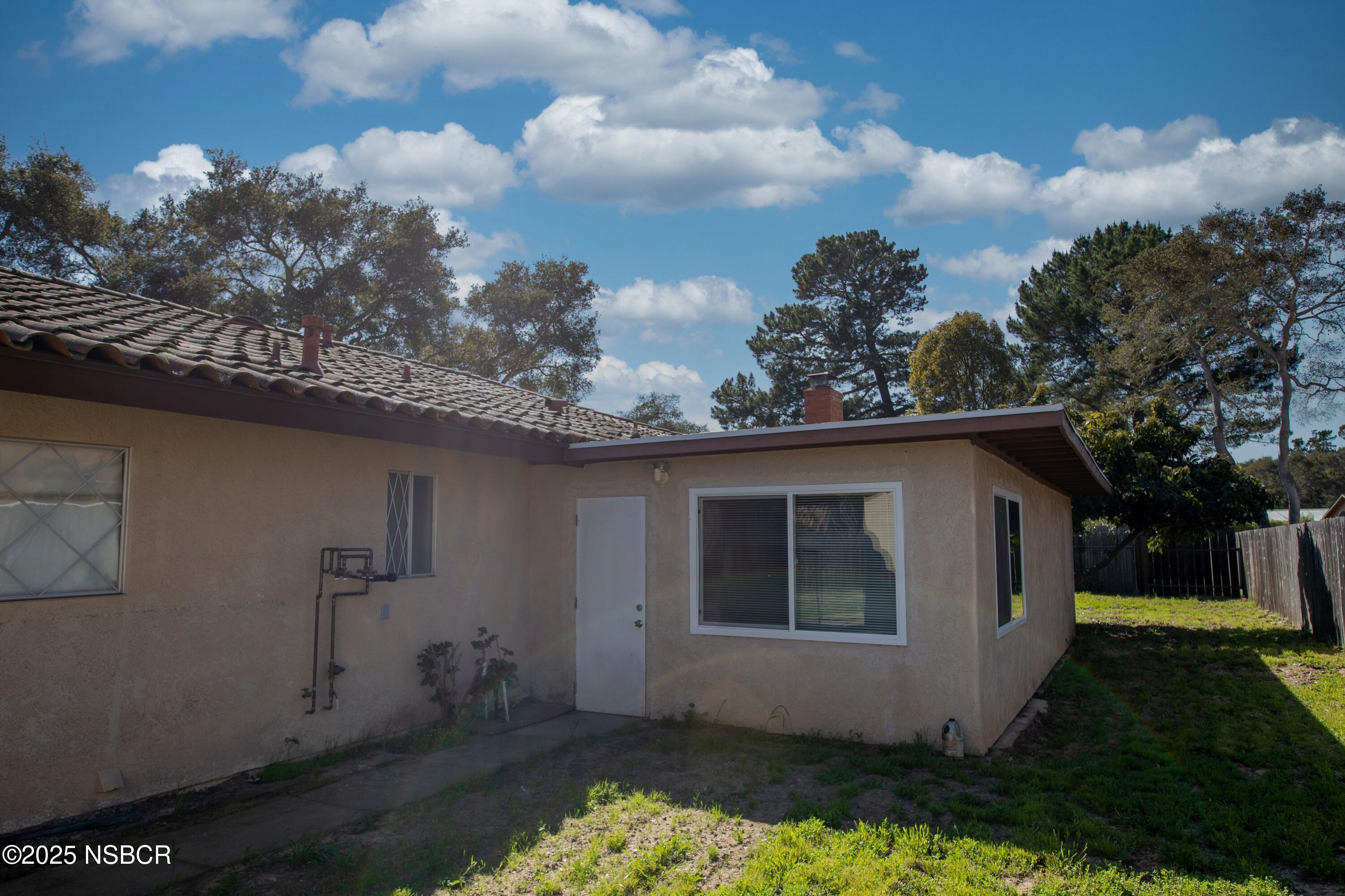 3118 Pellham Drive Lompoc, CA 93436 - Photo 55 of 56 a house with trees in the background