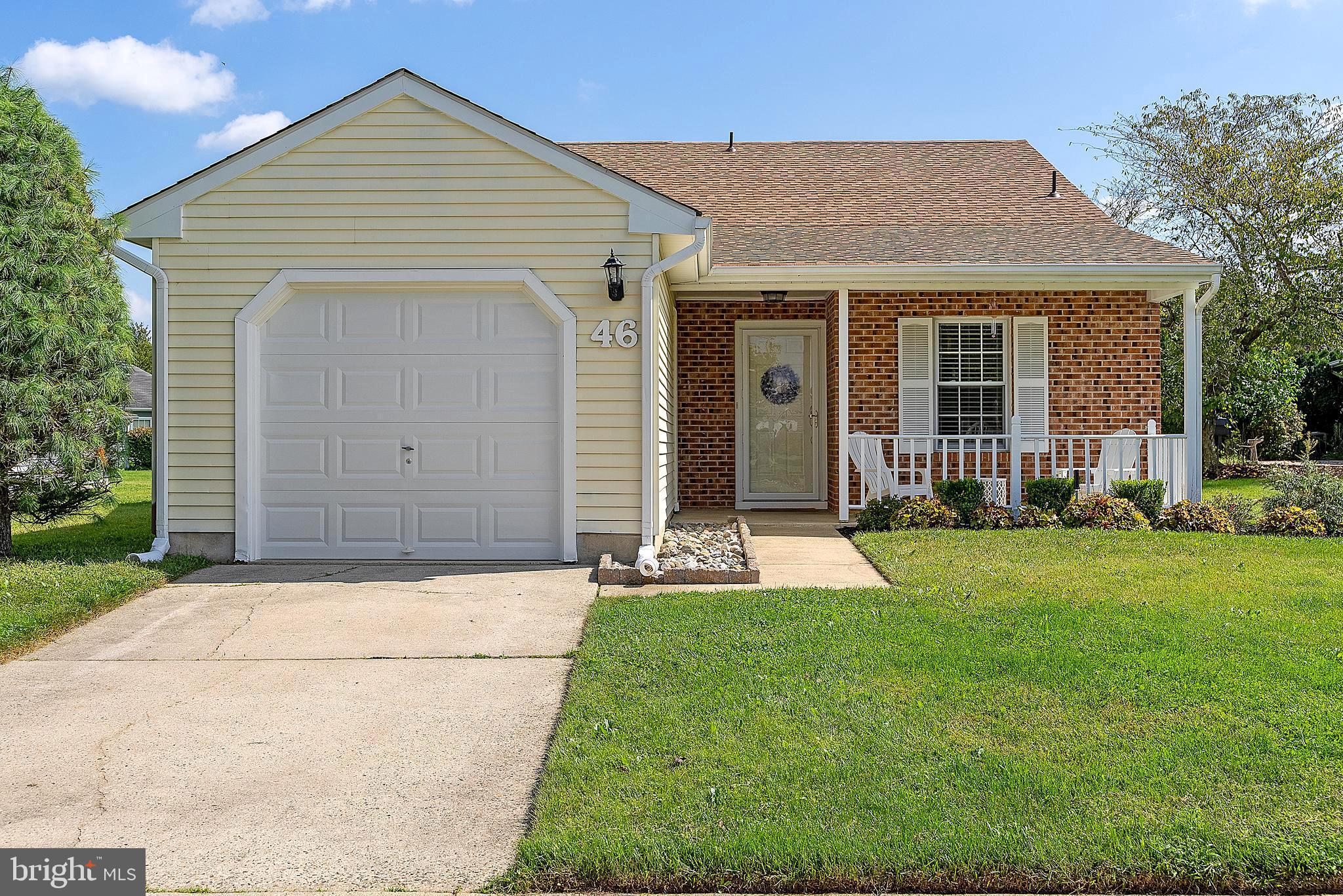 Front view, driveway & garage