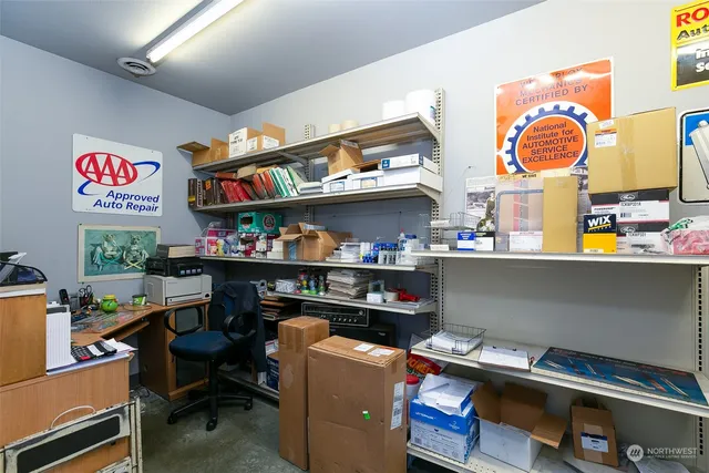 a view of a workspace with furniture