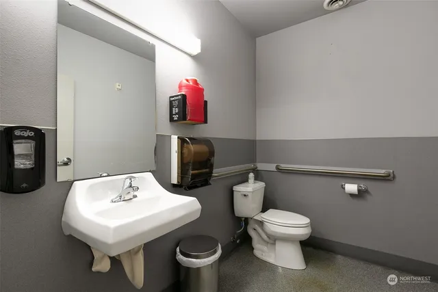 a view of a hallway with a lots of stuff and furniture