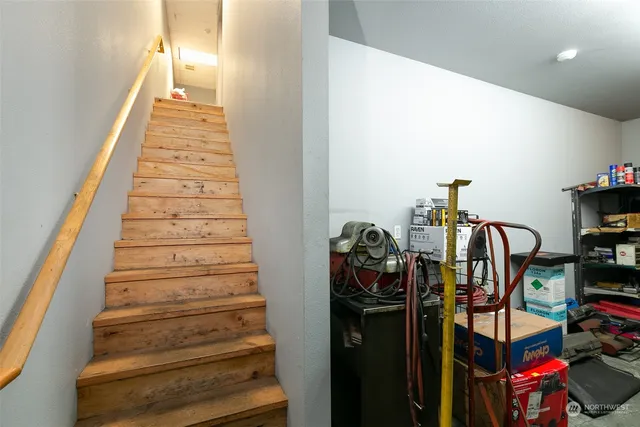 a view of a workspace with furniture and toys