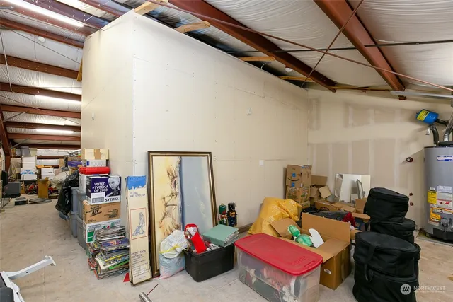 a room with gym equipment and a large window