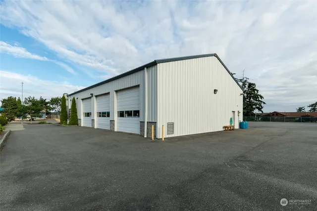 a view of a house with a big yard