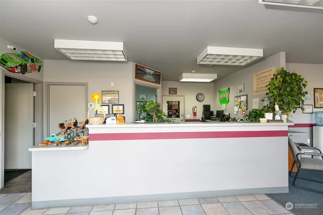 a view of living room with furniture and window